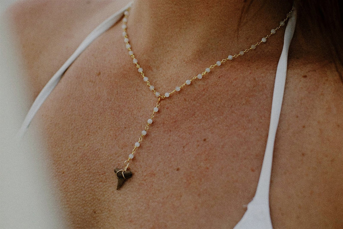 What Does a Shark Tooth Necklace Mean? (Symbolism + Why Everyone Is Wearing Them)